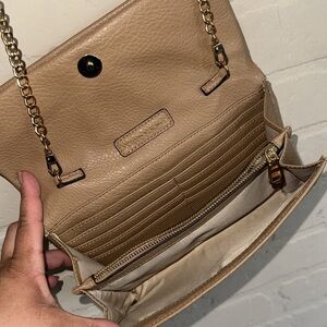 INC Elegant crossbody Tan faux Leather Bag
Fold over adjustable straps